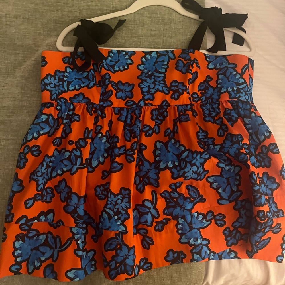Hunter Bell Orange Top with Blue Floral Design